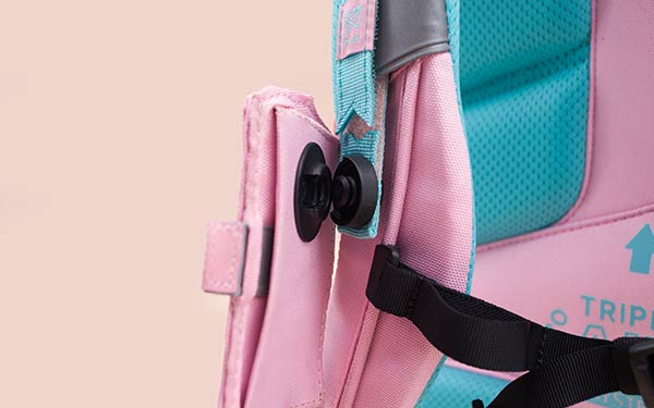 Tinicard being placed on the SNAP counterpart on shoulder strap