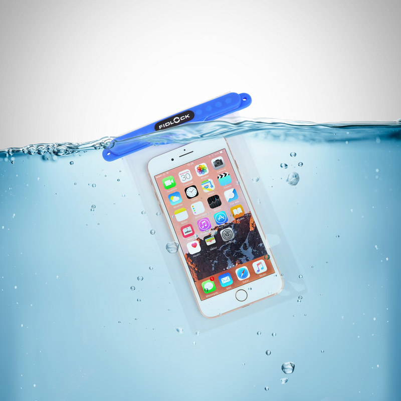 Example of the dry bag medi in transparent and blue floating in water