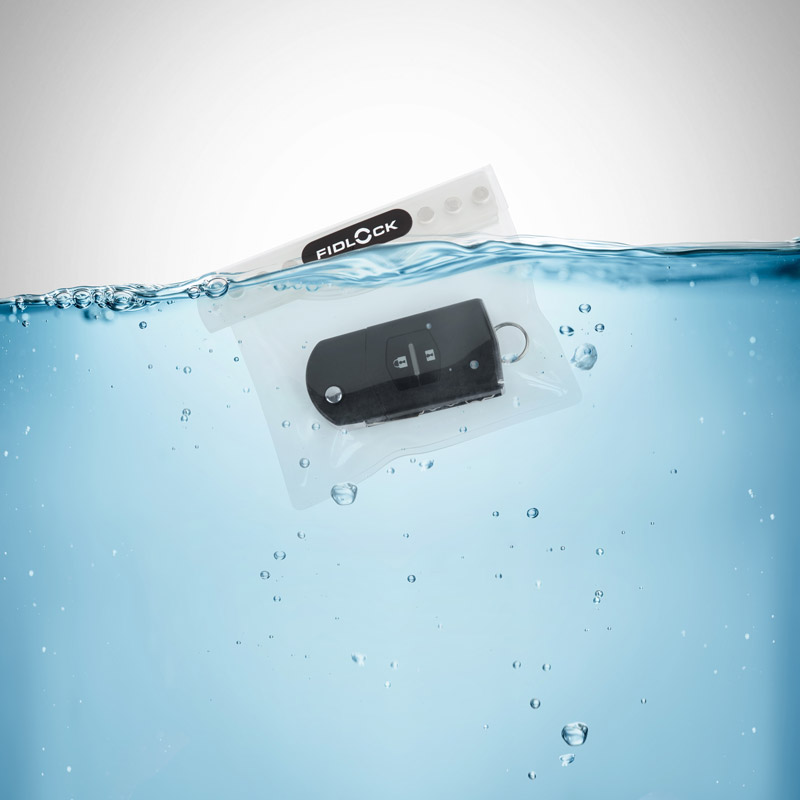 Example of the dry bag mini in transparent colour floating in water