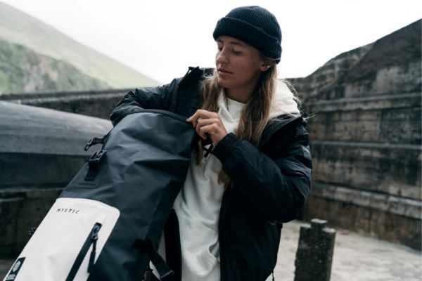opening the backpack by mystic with fidlock fastener