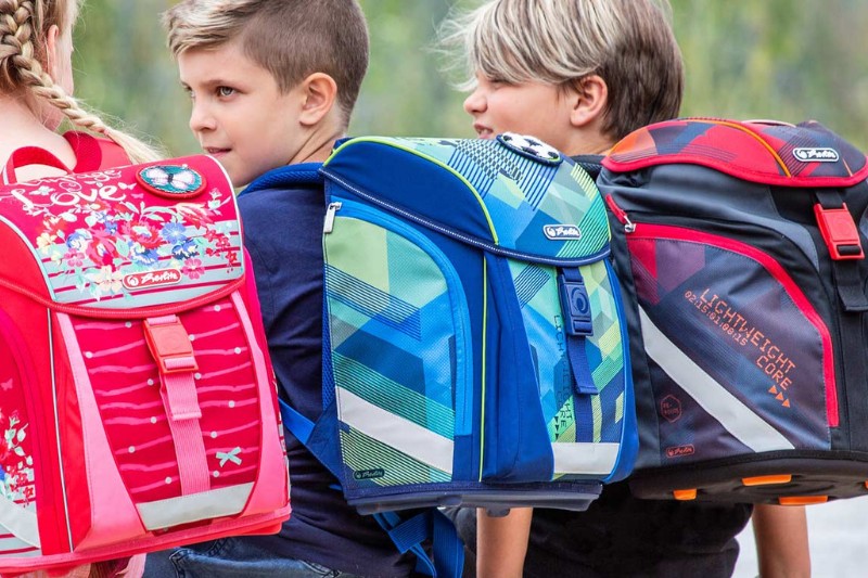 SNAP buckles on childrens school bags
