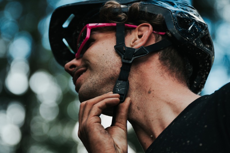 Man opening helmet