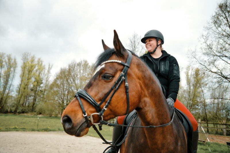 Woman riding horse