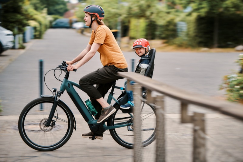 Mother and toddler on bike