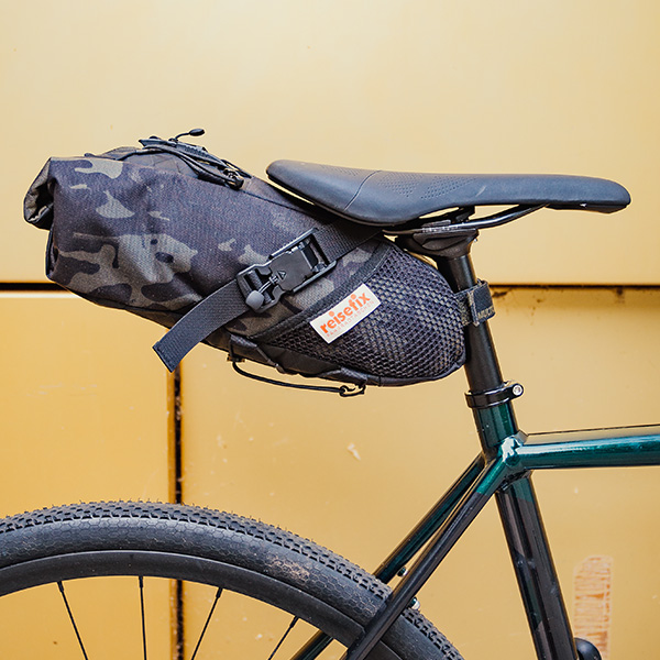 side view of a bike with reisefix bag and fidlock fasteners