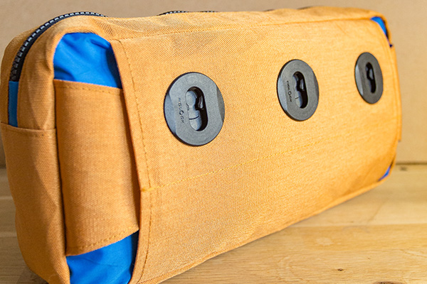 Picture of the side of the bag by reisfix with fidlock fasteners 