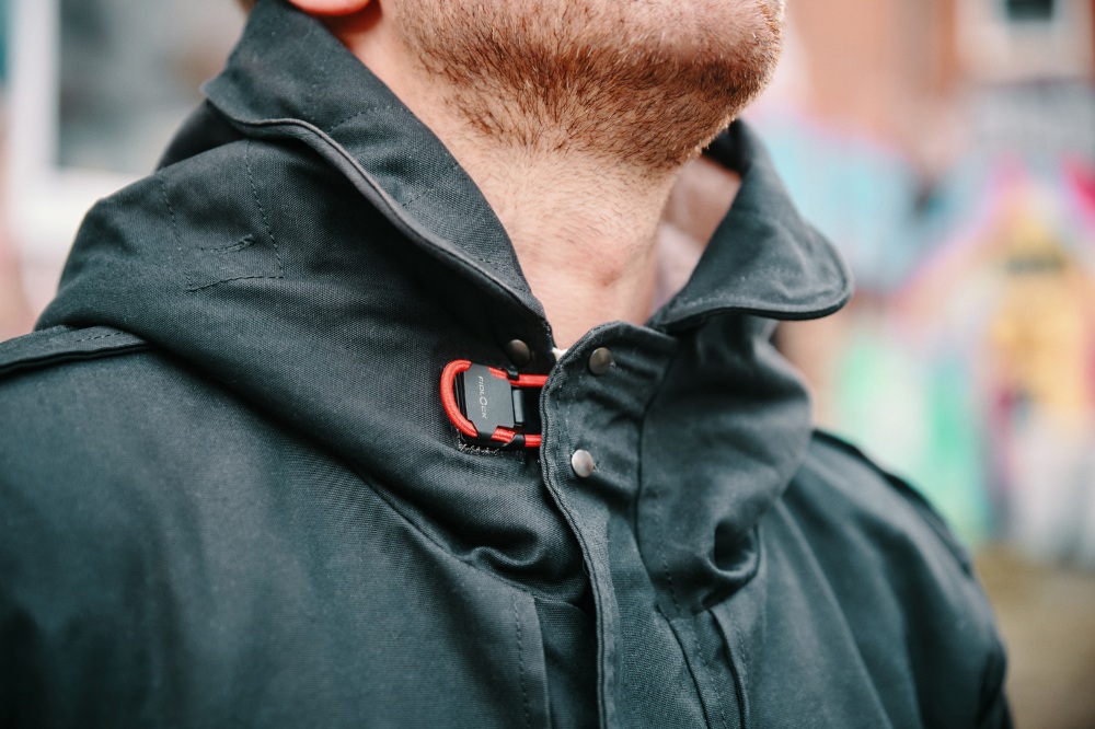 FIDLOCK buckle on collar of black jacket