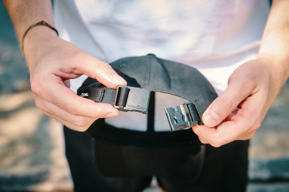 SNAP buckle on cap
