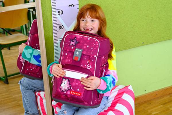 girl with GIANT school bag